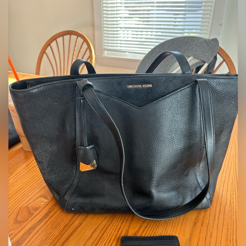 Michael Kors Black Leather Totes with Structured Design